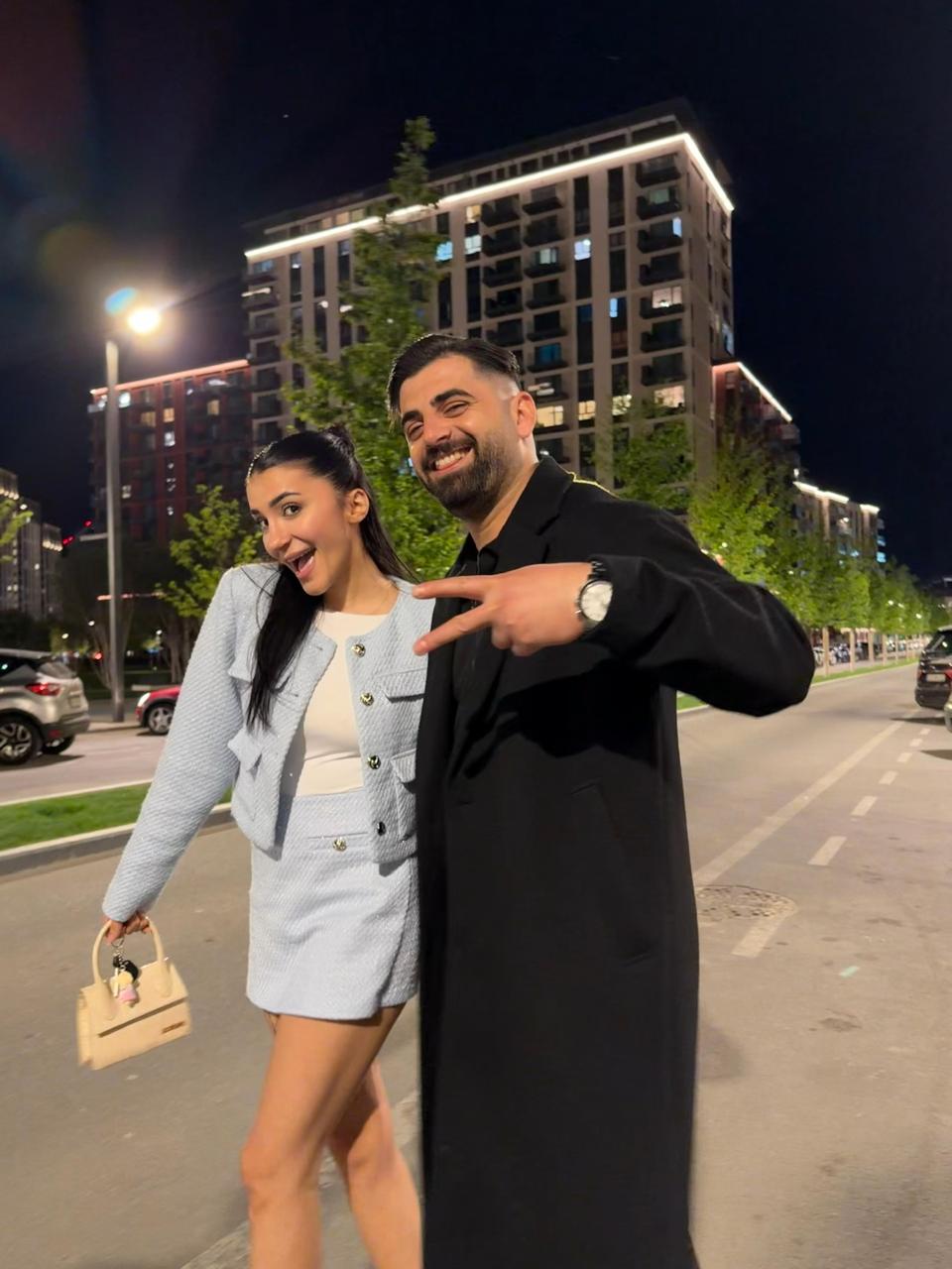 Murat & Nehir walking through the city at night